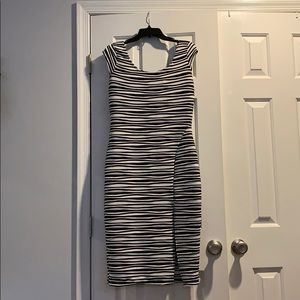 Women’s black and white striped dress.